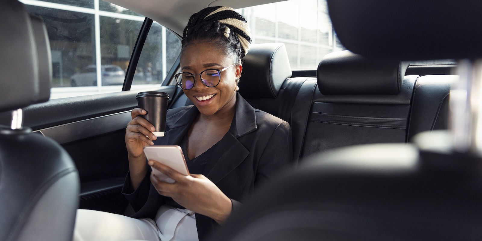 Passenger enjoying a comfortable private airport chauffeur ride in Lusaka