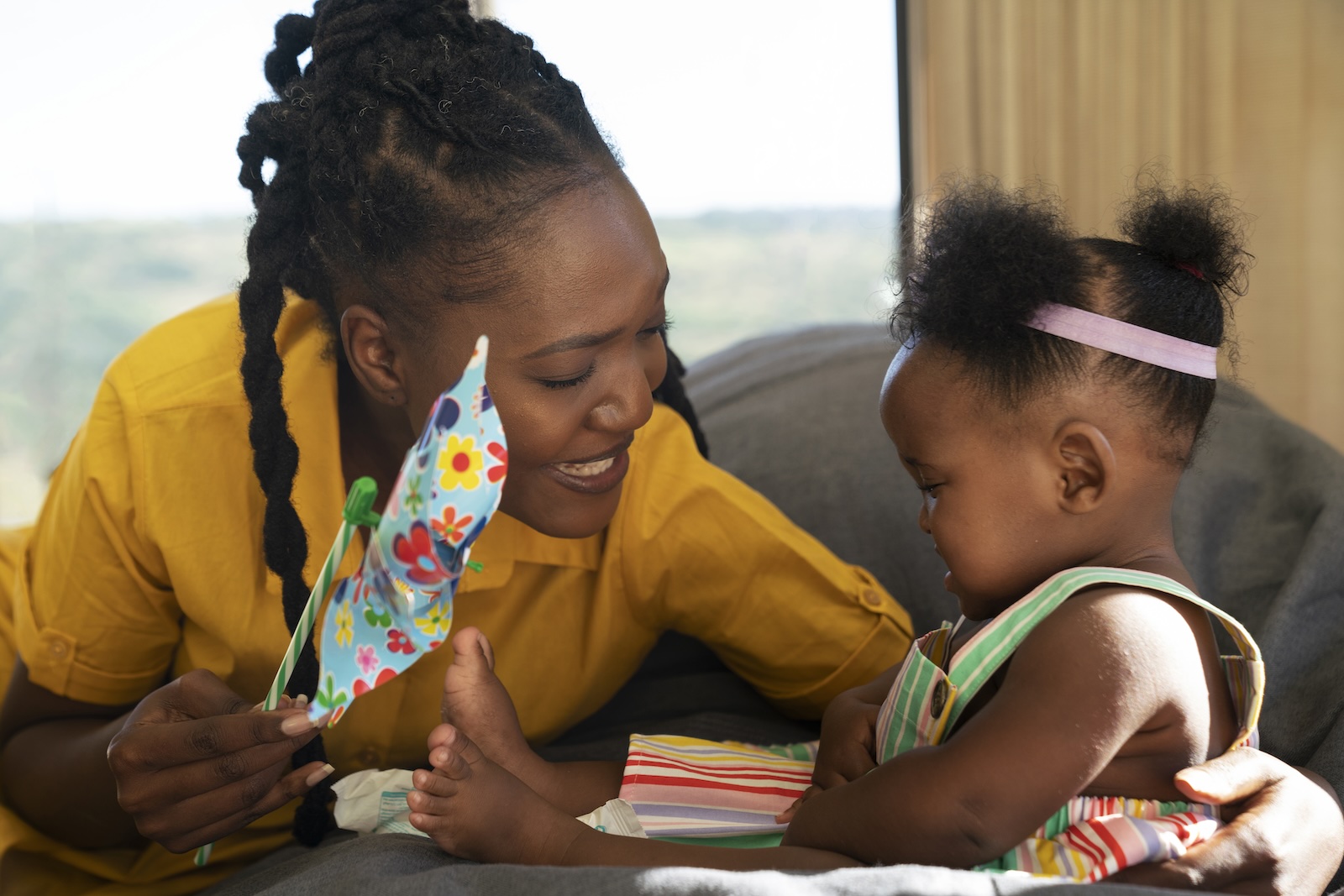 Experienced child minder caring for a young child in Lusaka home childcare service